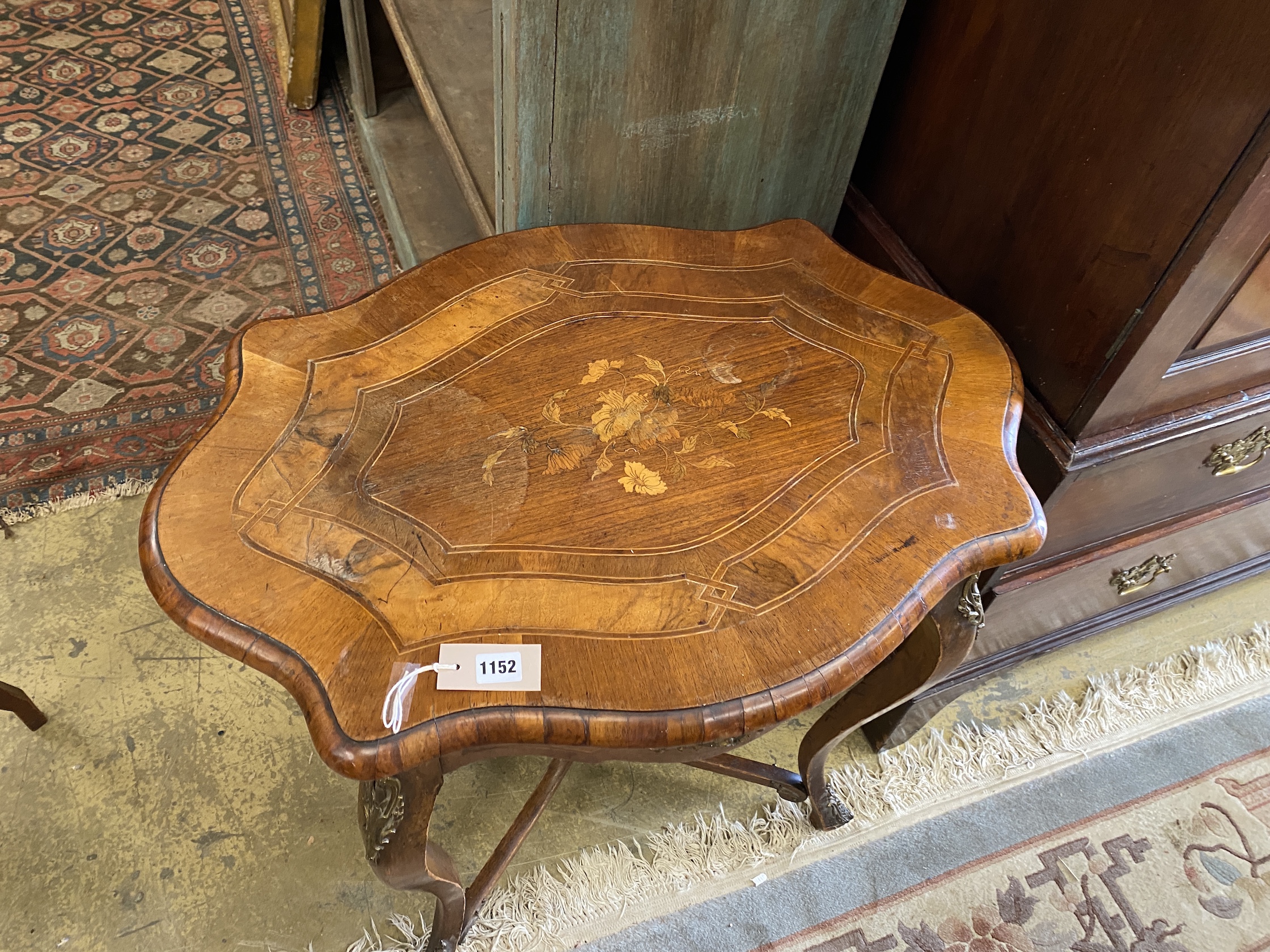 A 19th century French gilt metal mounted marquetry inlaid walnut oval centre table, width 78cm, depth 56cm, height 75cm